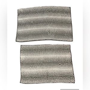 Grey and white bath mats